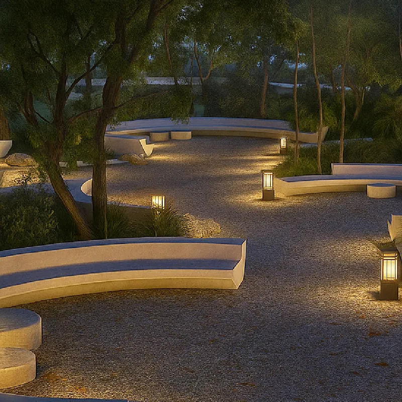 Curved stone benches around a fire pit, lit by lanterns at night
